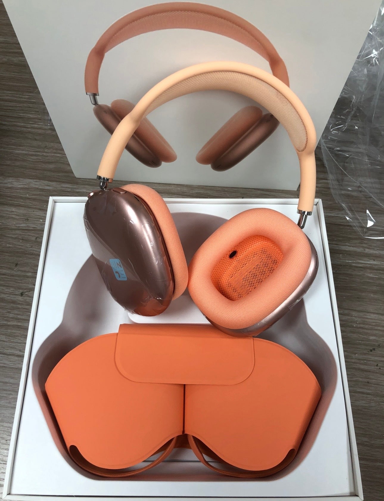 Orange apple AirPods Max